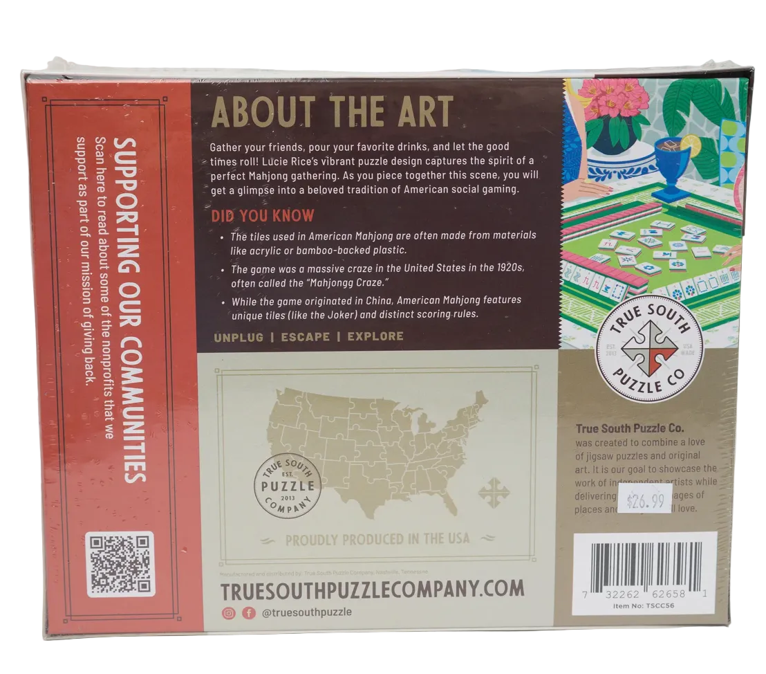 Back of a puzzle box with text about the art and supporting communities, featuring a map of the USA and a logo.