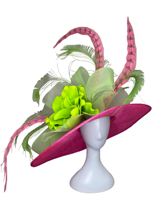 Decorative headpiece with pink feathers and green flowers on a neutral background