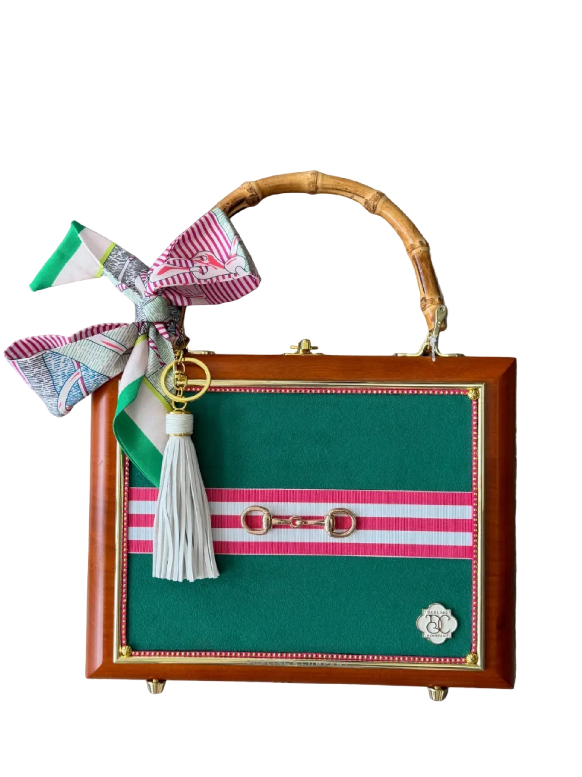 Cigar box purse with decorative bow and striped pattern on a wooden surface